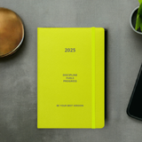 Velite Armor Premium Notebook in neon yellow with elastic closure, ideal for high-energy 2025 productivity and organization.