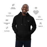 Velite Armor Premium Eco Hoodie in black with double-layered hood, topstitched seams, and flat drawcords. Sustainable activewear with a regular fit.