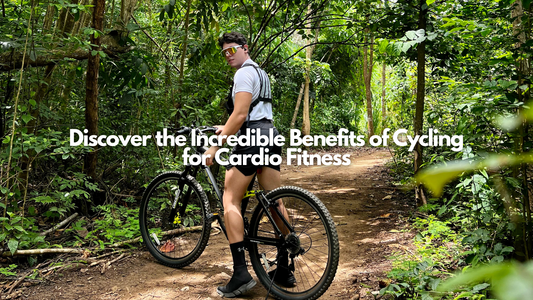 Man cycling through a green trail to improve cardio health and fitness

