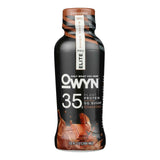 OWYN 35g Plant-Based Chocolate Protein Shake – Night gym scene with fitness lighting and motivational background.