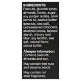 Ingredient list for KIND Peanut Butter Dark Chocolate Bars, featuring peanuts, almonds, soy, and no GMOs, with allergen warnings included.