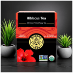 Hibiscus Tea front label next to indoor green plants, promoting calm and antioxidant-rich herbal benefits

