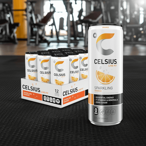 Celsius Sparkling Orange Energy Drink – Zero Sugar, 200 mg Caffeine case of 12 cans displayed in a gym setting, ideal for pre-workout energy boost.