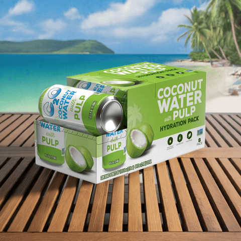 8-pack of Coconut Water with Pulp cans placed on a wooden deck with a beach and palm trees in the background, evoking a tropical and refreshing setting.