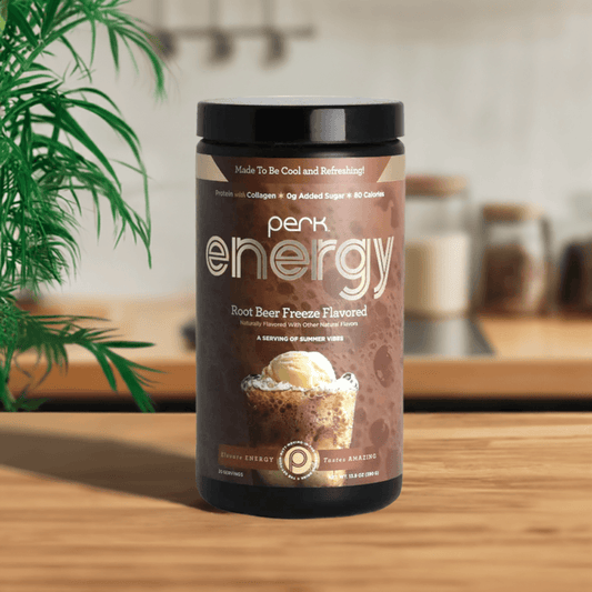 Perk Energy Root Beer Drink in kitchen setting, offering 20 servings of creamy, caffeine-boosted nutrition for steady energy and immune support.