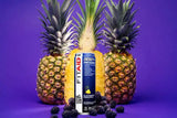 FitAid Energy cans in Blackberry Pineapple flavor displayed with sliced pineapples and blackberries on a vibrant purple background.

