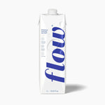 Flow Alkaline Spring Water 1L carton with minimalistic design on white background