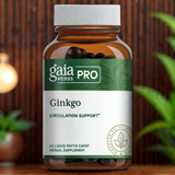 Gaia Herbs PRO Ginkgo supplement bottle containing 60 liquid phyto-caps for circulation support. The herbal supplement is displayed against a warm, natural background with green plants and soft lighting.
