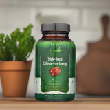 Amazing Grass Super Greens Capsules placed in front of small potted herbs, reinforcing plant-based wellness and clean living.