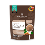 Front view of Truvani Organic Cacao Powder pouch with spoonful of cacao and cinnamon on design.