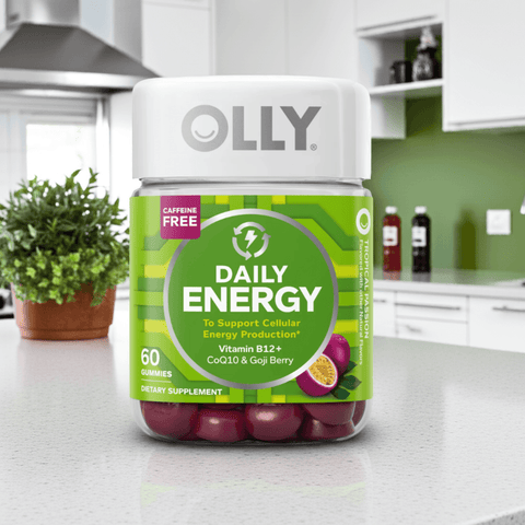 Olly Daily Energy Gummies – Tropical Passion flavor with B12, CoQ10, and Goji Berry, 60 ct bottle on kitchen counter. Caffeine-free energy support.