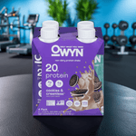 OWYN Vegan Protein Shake 20g – Cookies & Creamless multipack featured in fitness lifestyle setting with kettlebells.
