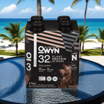 OWYN High Protein Chocolate Shake placed poolside, ideal vegan post-workout drink for summer fitness routines.