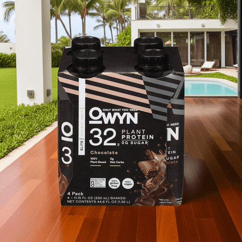 Plant-based OWYN Pro Elite Protein Shake in Chocolate flavor placed on wooden deck, perfect for post-workout recovery and keto support.