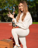 Active woman enjoying OWYN Pro Elite Chocolate Peanut Butter Protein Shake – perfect vegan protein for on-the-go nutrition.