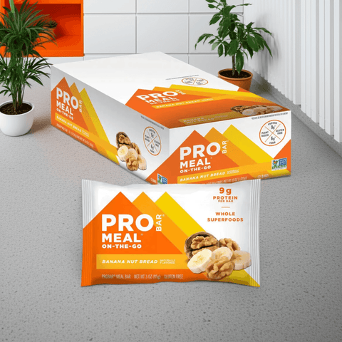 Probar Banana Nut Bread Meal Bar and box displayed in modern kitchen setting, high-protein vegan snack with real banana and nut ingredients