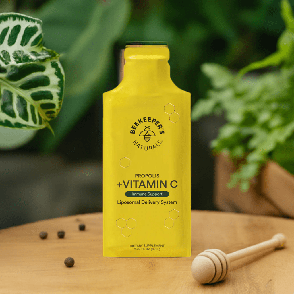 Propolis + Vitamin C Liposomal by Beekeeper's Naturals in a bright yellow pouch, designed for immune support and enhanced absorption. Ideal for skin health and post-workout recovery.