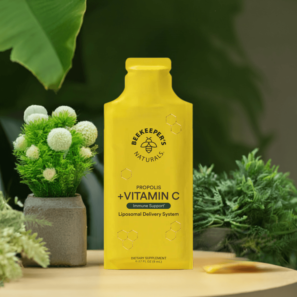 Propolis + Vitamin C Liposomal by Beekeeper's Naturals in a bright yellow bottle, designed for immune support and enhanced nutrient absorption.