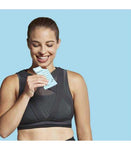 "Active woman enjoying RXBAR Vanilla Almond Protein Bar as a post-workout snack"

