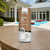 Slate Milk Classic Chocolate protein shake next to pool, highlighting a healthy, summer-friendly chocolate drink.