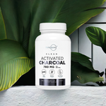 TypeZero Activated Charcoal Capsules with green leaves