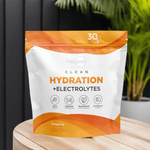 Type Zero Hydration Stick Packs in Tangerine flavor displayed on a wooden table, highlighting electrolytes and vitamins for optimal hydration.