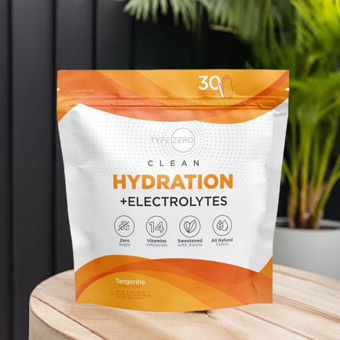 Type Zero Clean Hydration + Electrolytes supplement in Tangerine flavor. The packaging highlights key features: zero sugar, 14 vitamins and minerals, sweetened with stevia, and all-natural colors. The product is designed for optimal hydration and electrolyte replenishment, containing 30 servings per package.