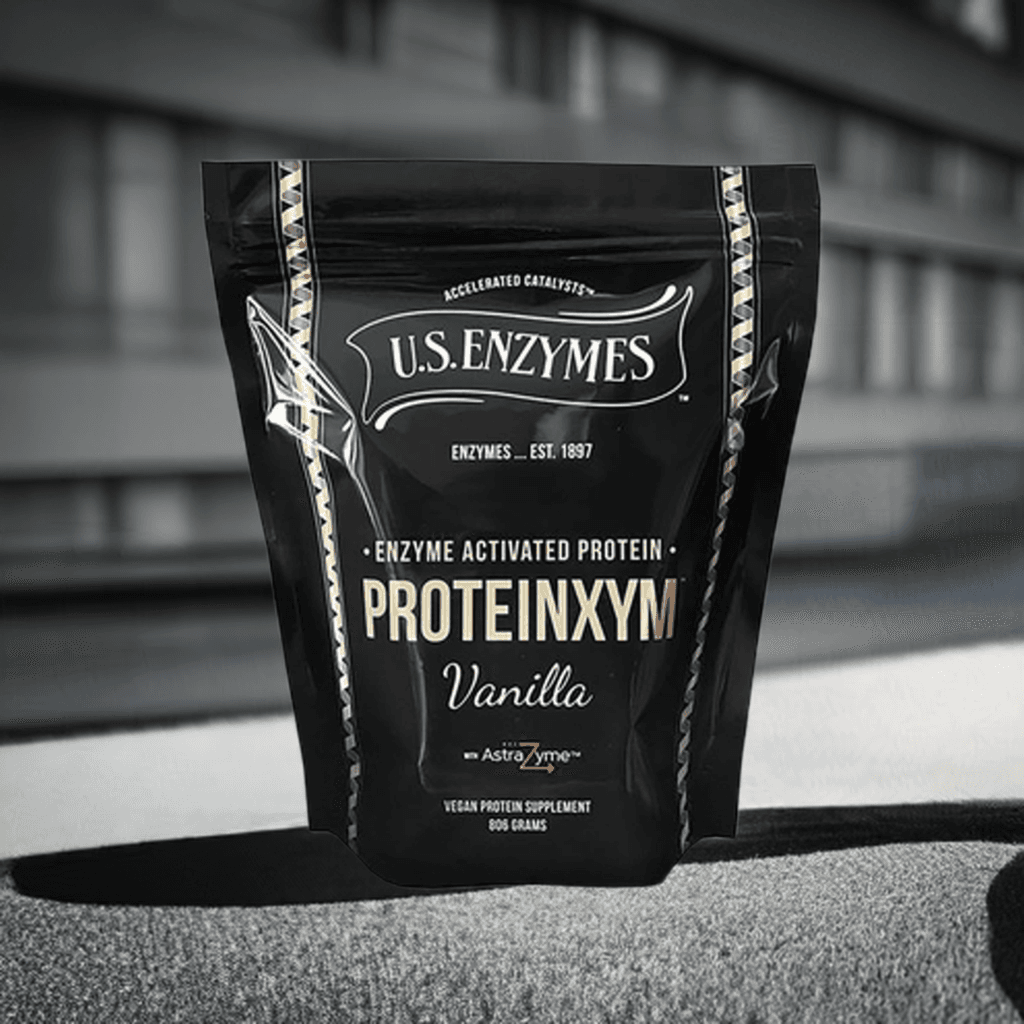 Proteinxym Vanilla by U.S. Enzymes in black pouch packaging, showcasing vegan protein powder with AstraZyme for enhanced digestibility and purity.