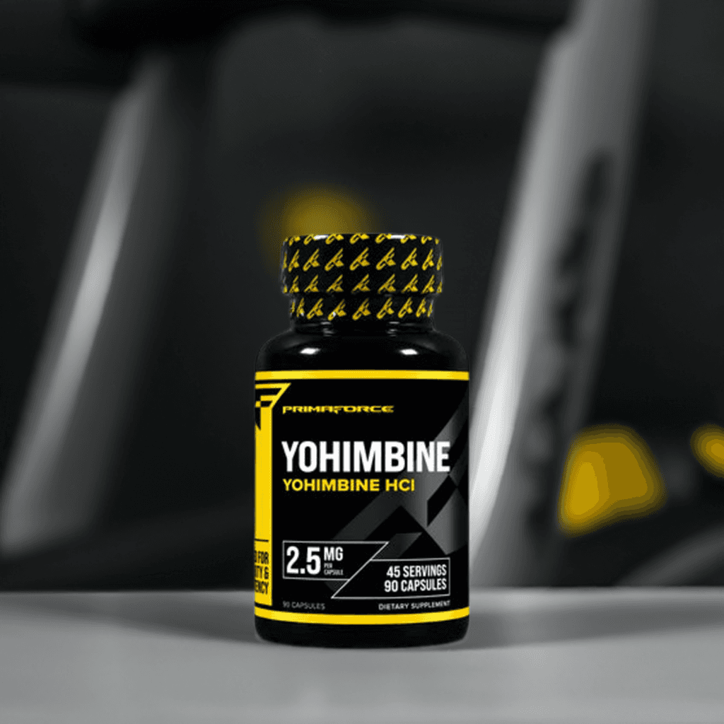 Close-up of PrimaForce Yohimbine HCl 2.5 MG bottle in a gym setting, a natural weight loss and energy-boosting supplement.
