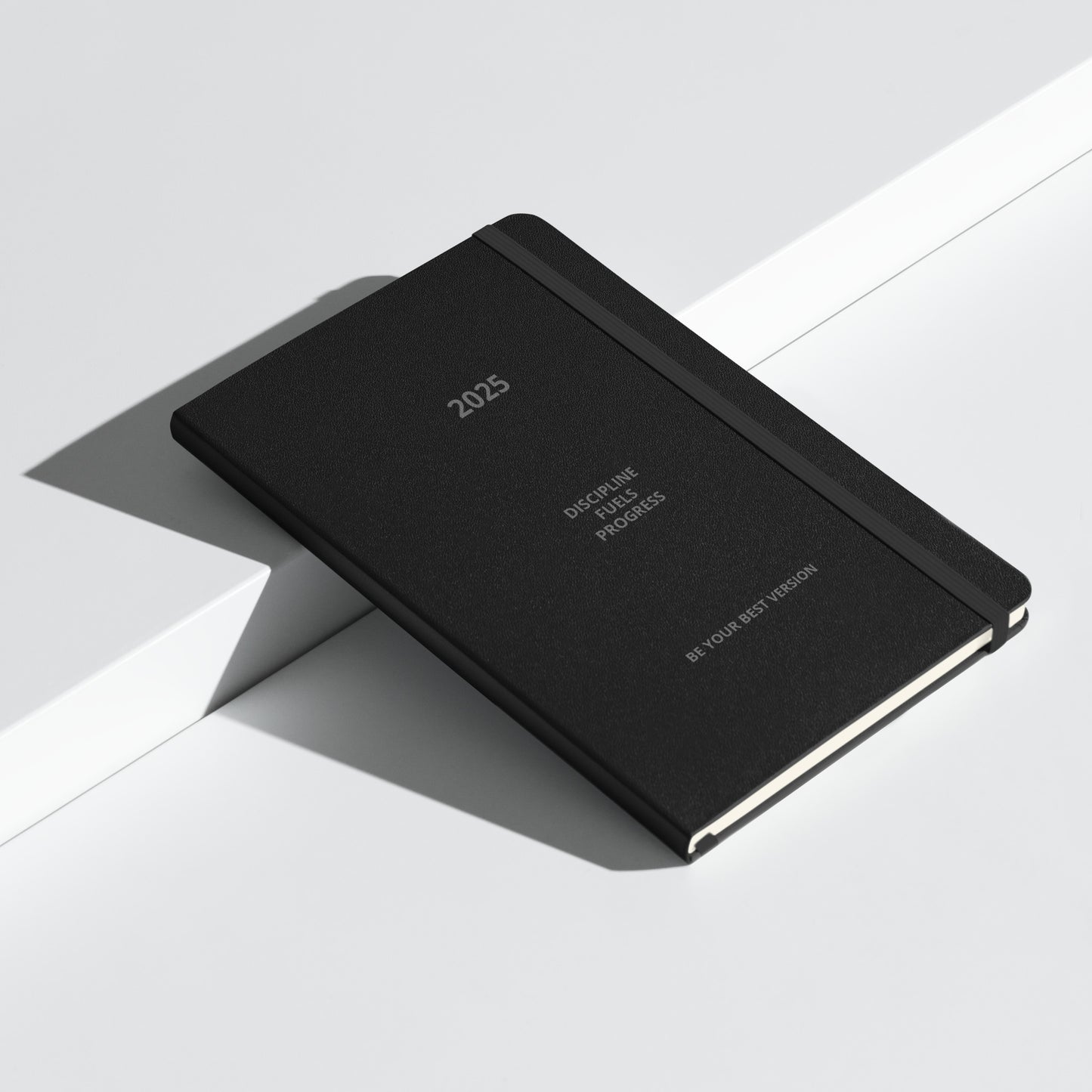 Black Velite Armor Premium Notebook with embossed branding and dual ribbon markers, designed for premium organization in 2025.