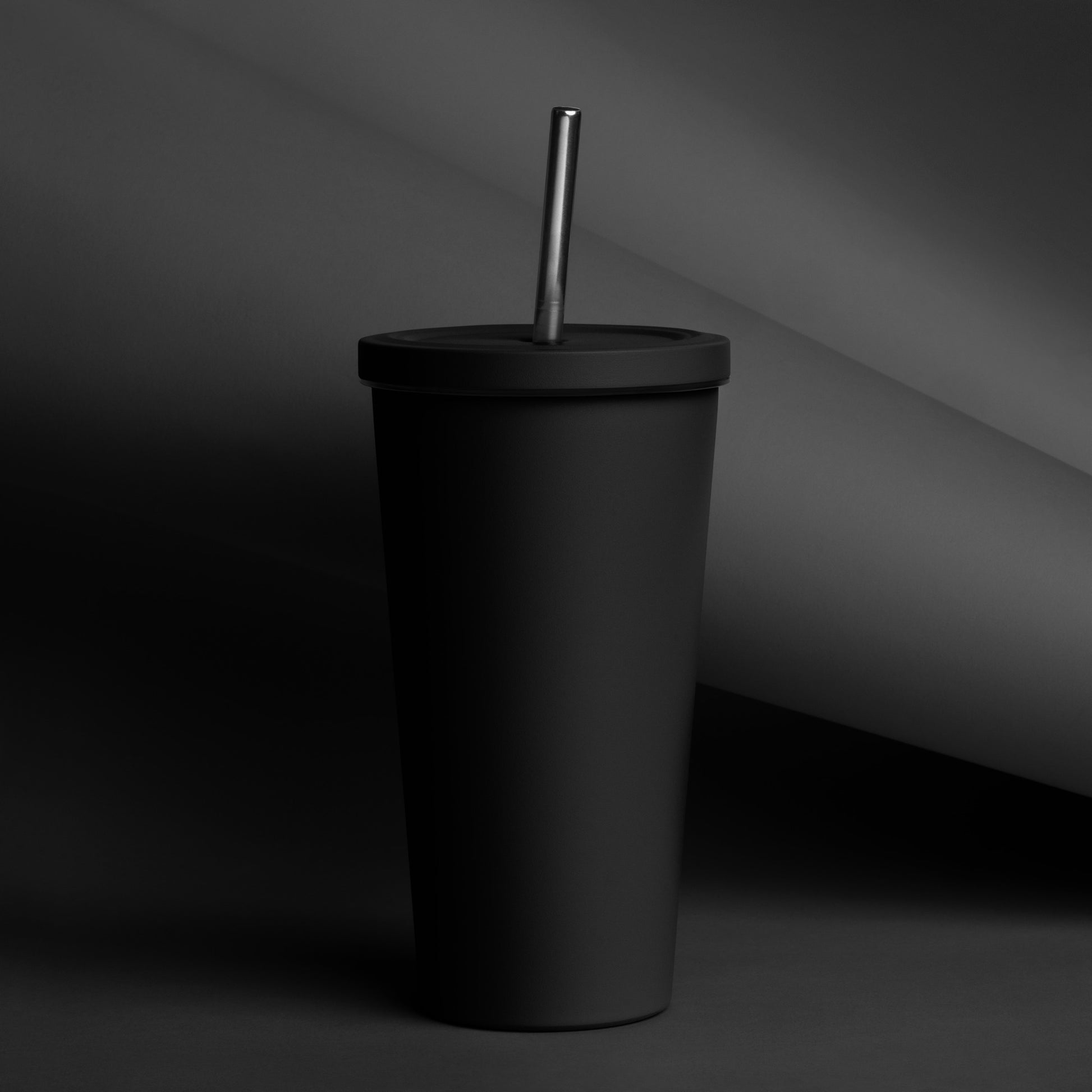 Matte black Velite Armor Insulated Tumbler without text, showcasing sleek minimalist design for modern drinkware needs.