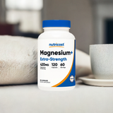 Magnesium+ Extra Strength Capsules on table