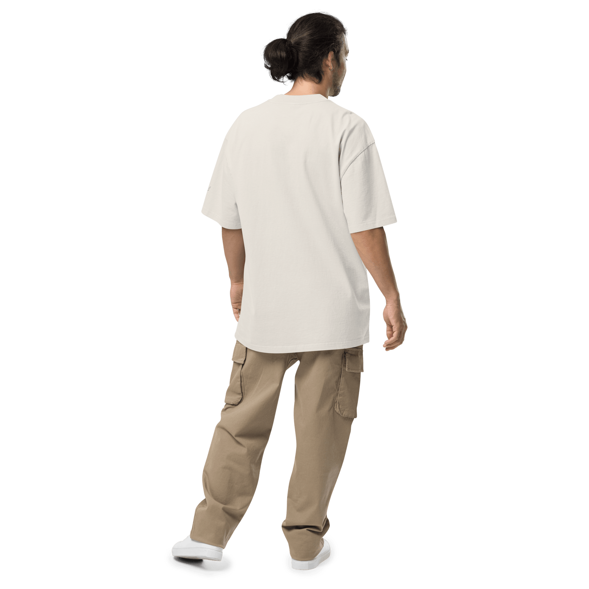 Model showing back of Velite Armor Oversized Embroidered Tee – Premium Heavyweight in off-white, paired with beige cargo pants.