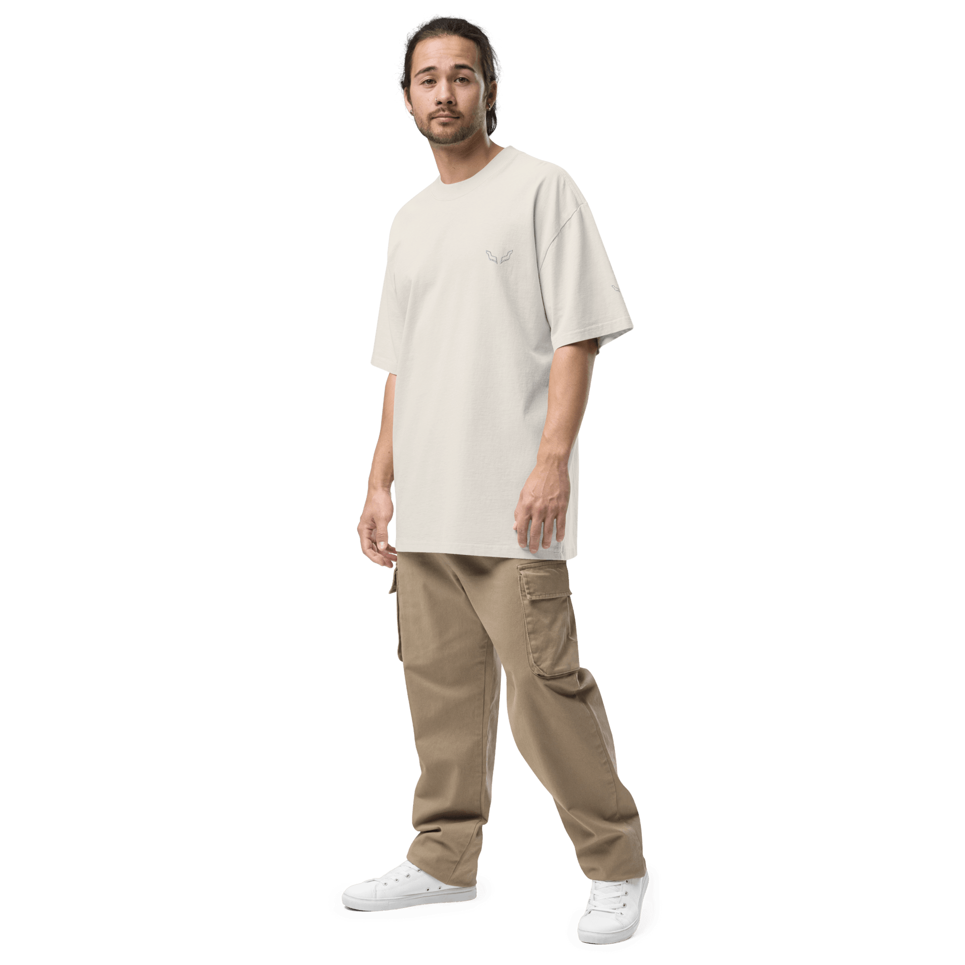 Model in Velite Armor Oversized Embroidered Tee – Premium Heavyweight off-white variant, paired with beige cargo pants and white shoes.