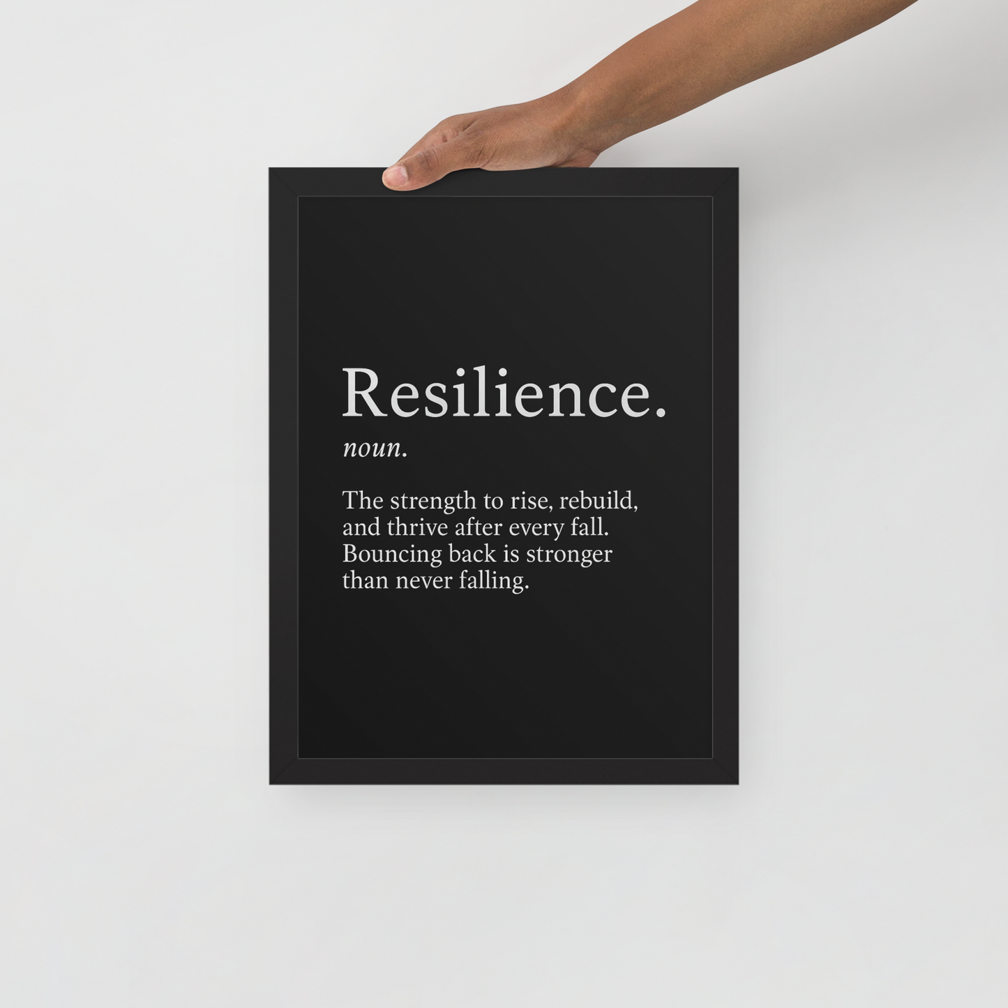 Resilience Framed Poster 12x16 features a bold black background with white motivational text, ideal wall art for success and home office decor.