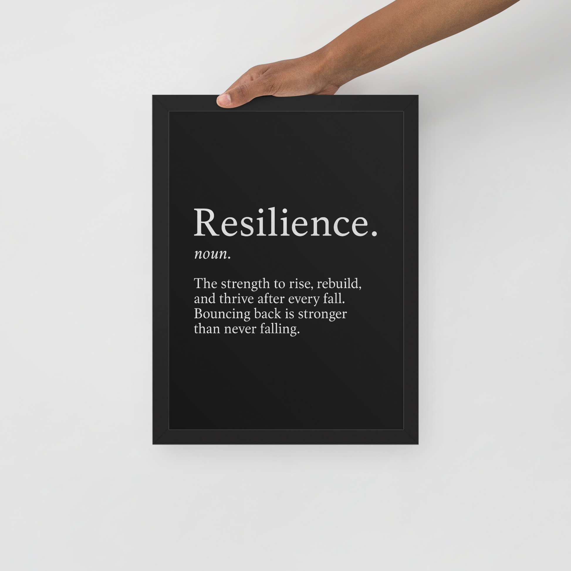 Resilience Framed Poster 12x16 features a bold black background with white motivational text, ideal wall art for success and home office decor.
