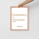 Hand holding the Consistency Framed Poster 12x16, showcasing minimalist motivational wall art perfect for home gym or office decor.