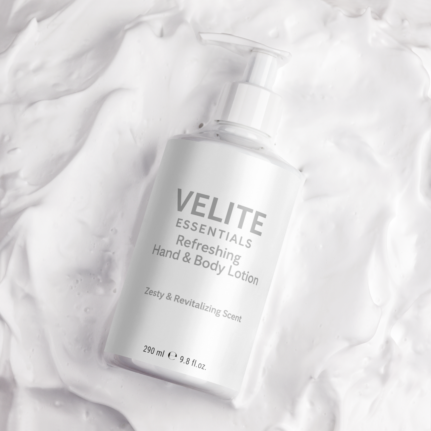 Velite Essentials Lotion - Vegan Hand Body Care bottle on creamy lotion background, highlighting its hydrating formula and texture.