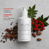 Velite Essentials Lotion - Vegan Hand Body Care bottle surrounded by cocoa butter and rowan berries, emphasizing natural ingredients.