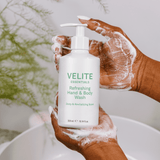 Hands lathering Velite Essentials Citrus Fresh Body Wash, showcasing its gentle, moisturizing cleanse ideal for all skin types and clean beauty routines.