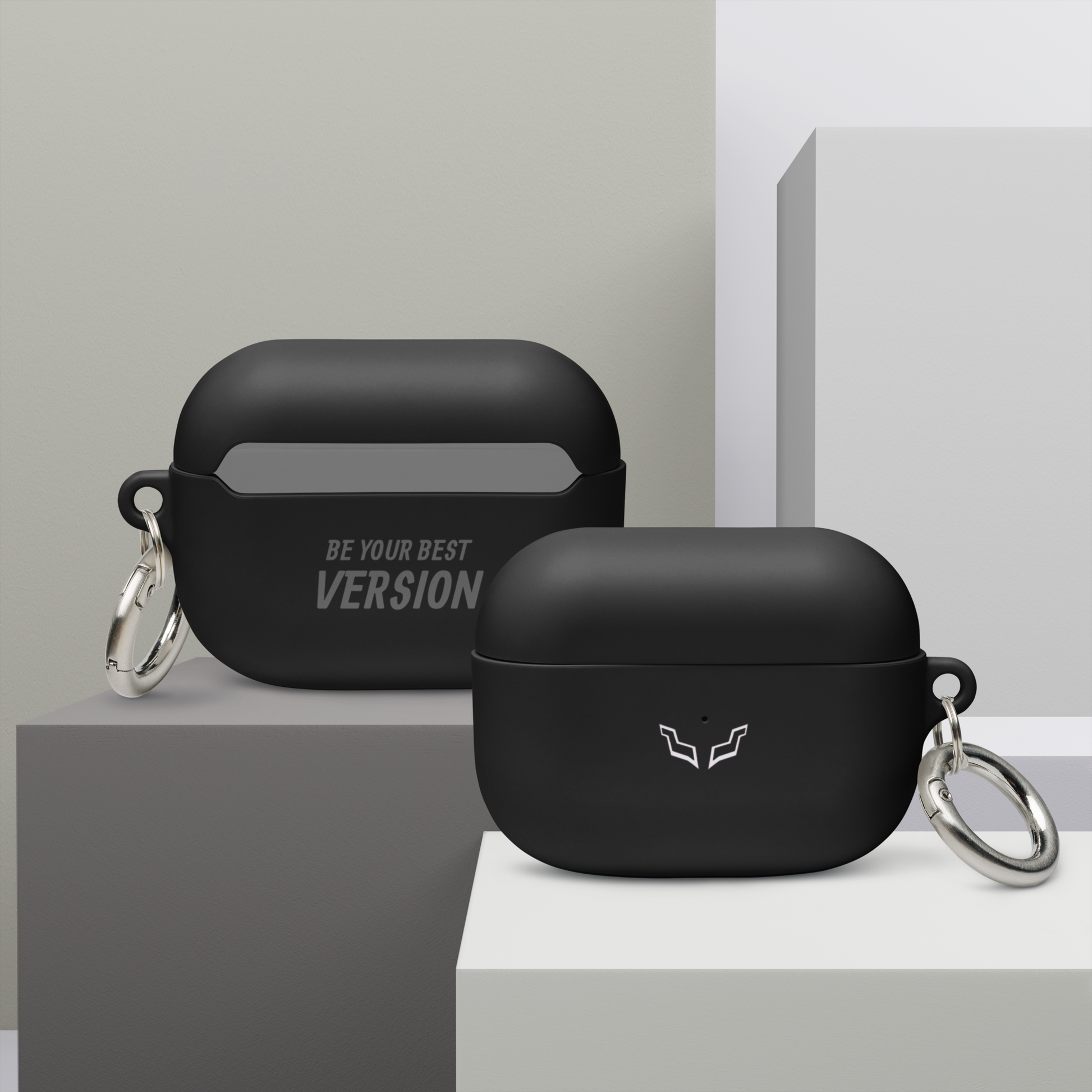 Minimalist AirPods Pro case in black rubber with Velite Armor logo and visible LED light. / Funda minimalista para AirPods Pro en goma negra con logo de Velite Armor y luz LED visible.
