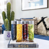 VOSS Still Water 375ml placed on a modern table next to healthy snacks and decor – ideal for stylish hydration.