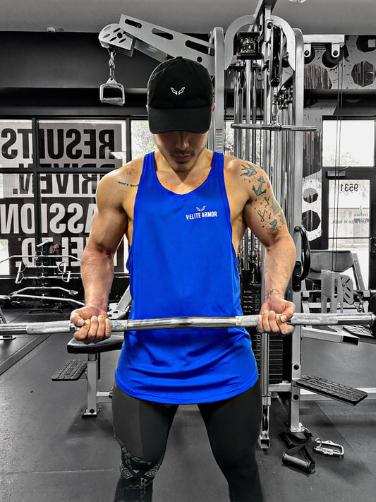 Royal Booster High-Performance Athletic Wear tank top in blue with Velite Armor logo, designed for sweat-wicking and durability during weightlifting.