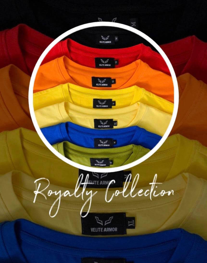 Velite Armor Royalty Collection T-shirts stacked in rainbow colors, emphasizing vibrant options and premium branding.